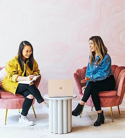 Two women discuss cyber strategy